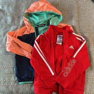 2 boys size 3T (one rain jackett, one zip up)